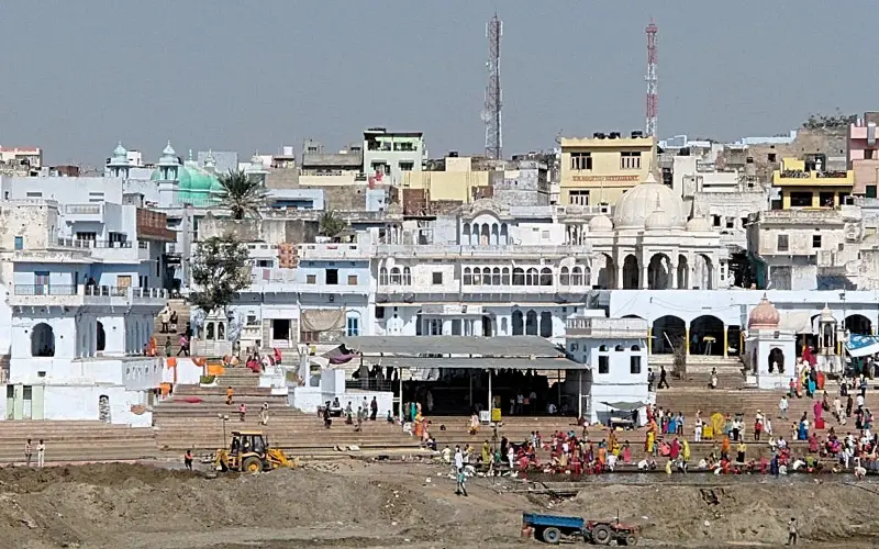 Ghats oni Pushkar's lake being dredged Rajasthan